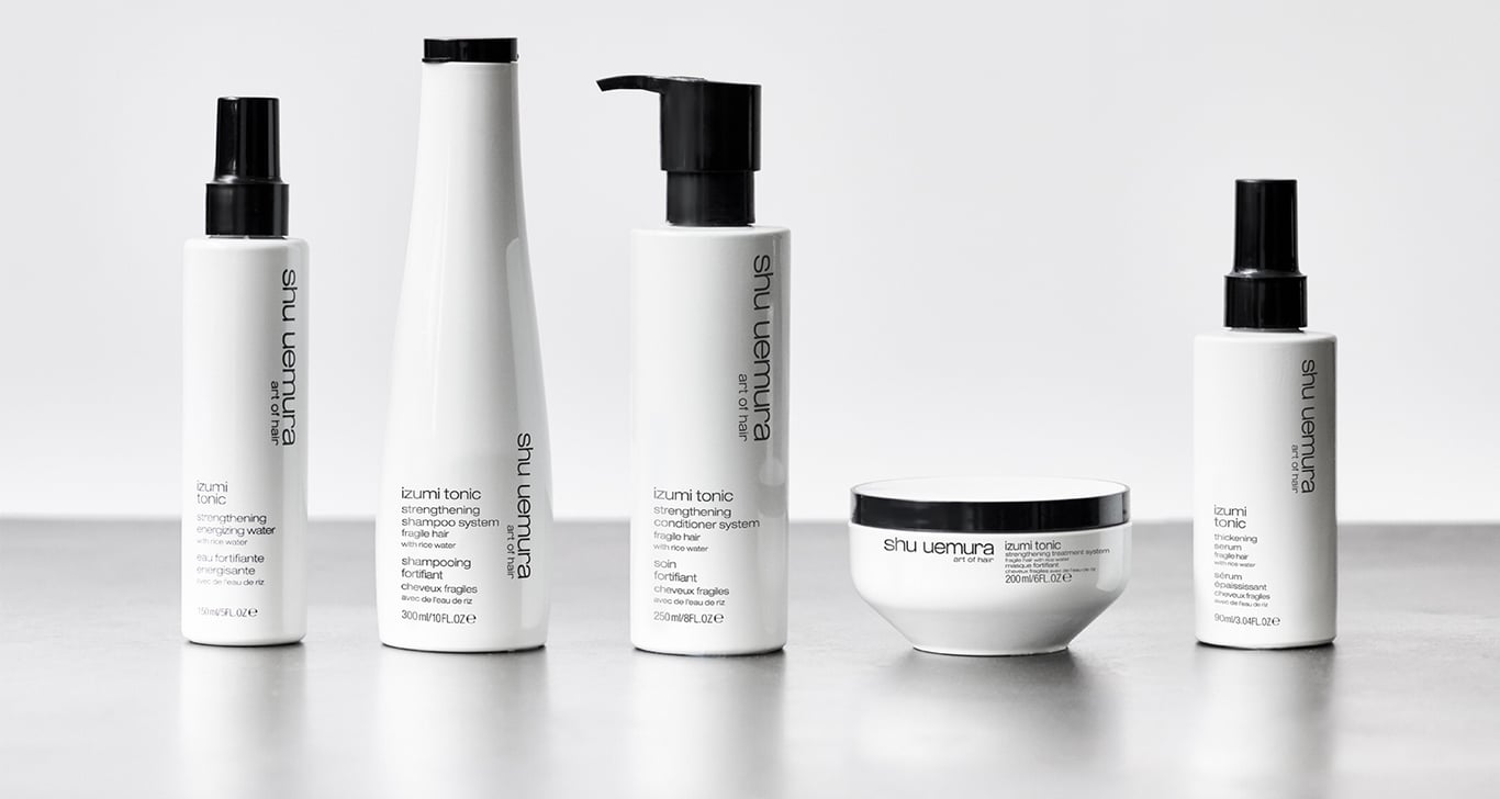 Bilde Shu Uemura Ashite Supreme shampoo + bilder av blomster. Dekorativt bilde som linker til artikkel om serien.