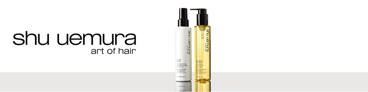 Toppbanner til Shu Uemura Art of Hair. Bildet er av to hårprodukter med hvit og rosa bakgrunnsbilde.
